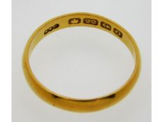 A 19thC. 22ct gold wedding band, date mark for 186