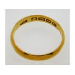 A 19thC. 22ct gold wedding band, date mark for 186