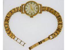 A ladies 9ct gold cased wristwatch & strap by Long