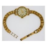 A ladies 9ct gold cased wristwatch & strap by Long