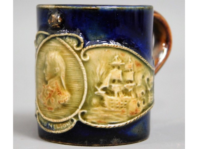 A 19thC. miniature Royal Doulton stoneware tankard