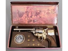A boxed single action Colt Army 45 display model