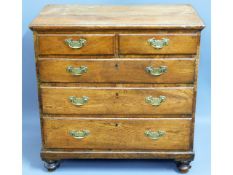 A small 19thC. oak chest of five drawers, 32in hig