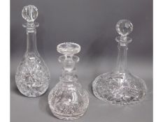 A cut glass ring top decanter, two small chips, a