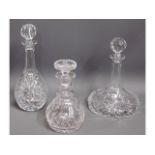 A cut glass ring top decanter, two small chips, a