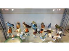 A quantity of Goebel porcelain bird figures, one b