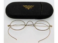 A pair of 10ct gold framed George Spiller spectacl