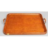 A 1920's oak lap tray with oak & brass handles, 21