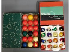 A boxed set of 48mm snooker balls twinned with a b