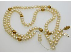 A cultured pearl necklace with 14ct gold fixings &