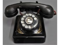 A Bell MFG Company telephone, converted, some fray