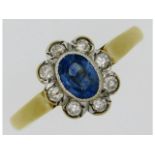 A 9ct gold sapphire & diamond ring, approx. 0.7ct