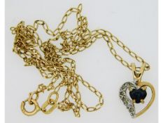 A 9ct gold chain & pendant with diamond & sapphire