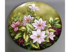 An early 20thC. large hand painted floral porcelai