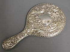 An ornate silver backed vanity mirror, Chester hal
