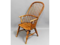 A c.1800 elm sack back Windsor chair, 41in high to