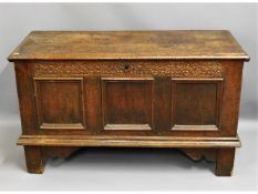 An 18thC. oak coffer with candle box, 47.75in wide