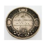 A late Victorian silver medal awarded by Hywell &