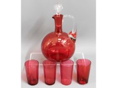 A Victorian cranberry glass decanter & glass set,