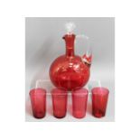 A Victorian cranberry glass decanter & glass set,