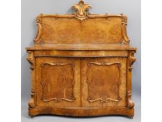 An ornate 19thC. walnut credenza with cupboard und