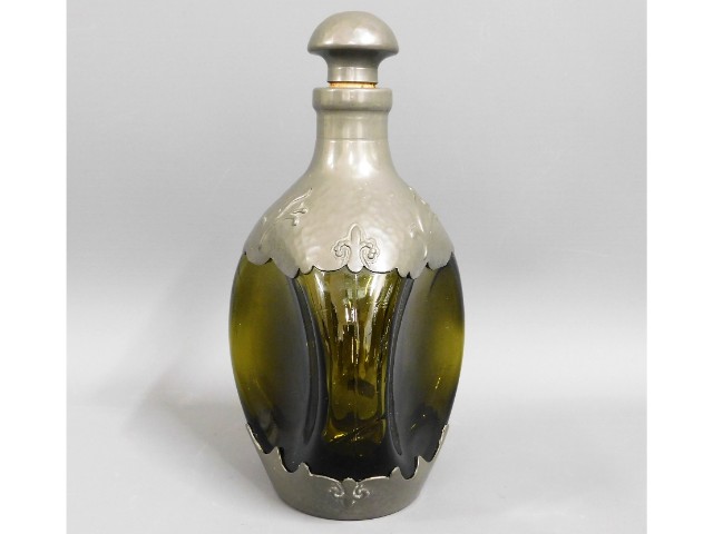 A Dutch Zeister pewter mounted decanter, 9in tall