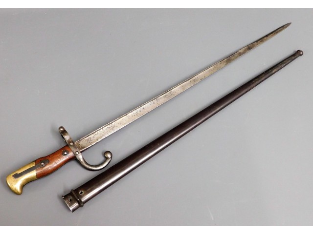 A French 19thC. bayonet & scabbard, 26in long