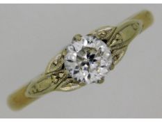 A 9ct yellow gold ring with white gold setting of