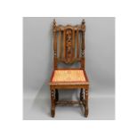 A single oak hall chair with organic carving, 42in