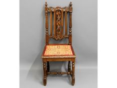 A single oak hall chair with organic carving, 42in