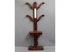 A Victorian mahogany hall tree with central mirror