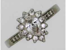 A platinum ring set with approx. 0.39ct pear cut d