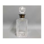 A silver collared cut glass decanter, 10.5in tall