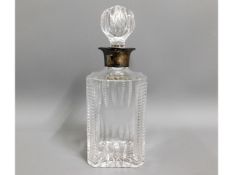 A silver collared cut glass decanter, 10.5in tall