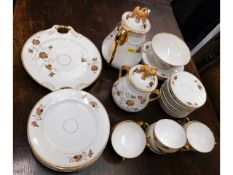 A 37 piece early 20thC. gilded porcelain coffee &