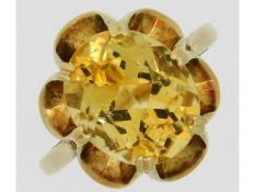 A 9ct gold citrine ring with floral setting, 3.4g,