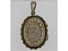 An 1881, Victorian Birmingham silver locket with c