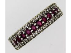 A half eternity band set with diamond & ruby, 3.9g