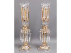 A pair of large continental gilded crystal lustres