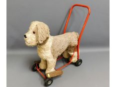 A vintage Lines Bros. ride/push along dog toy, eye