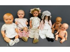 Seven dolls including a wired/strung one, three 19