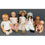 Seven dolls including a wired/strung one, three 19