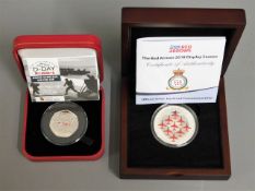 A cased Pobjoy mint silver proof D-Day fifty pence