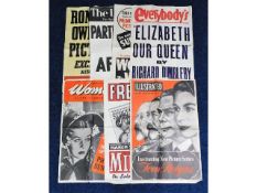 Seven vintage media advertising posters (30in x 20