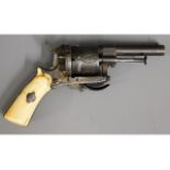 A 19thC. ladies muff pistol with ivory fittings, 5