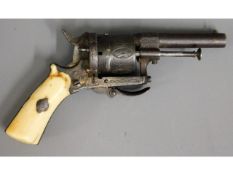 A 19thC. ladies muff pistol with ivory fittings, 5