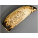 A resin copy of a scrimshaw worked whale tooth, 6i