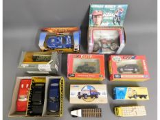 A quantity of boxed vintage diecast model vehicles