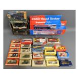 A quantity of boxed vintage diecast model vehicles