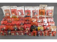 Approx. 82 packaged Del Prado figures including so